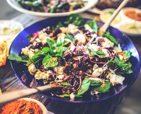 The Spicy Olive’s Strawberry and Avocado Spinach Salad with Raspberry Balsamic Vinaigrette